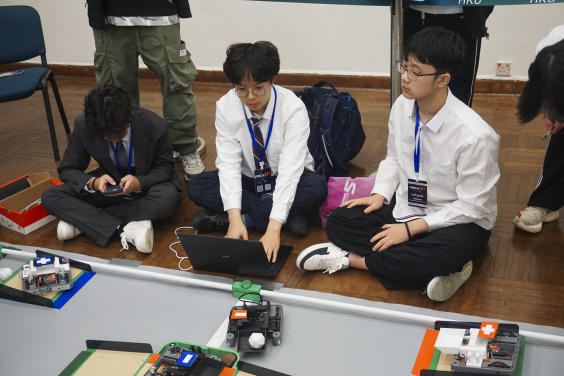 Students competing during the robotics challenge session